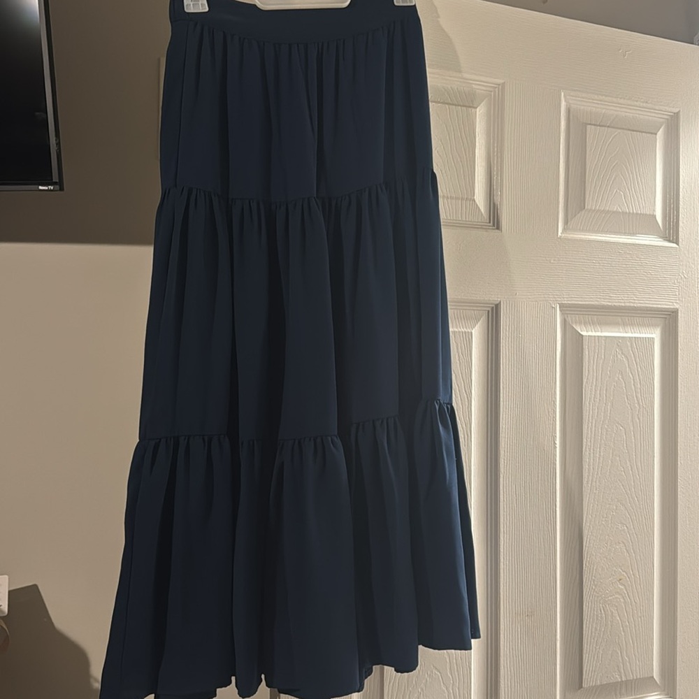 Navy blue maxi skirt. New without tags, never worn just tried on once.